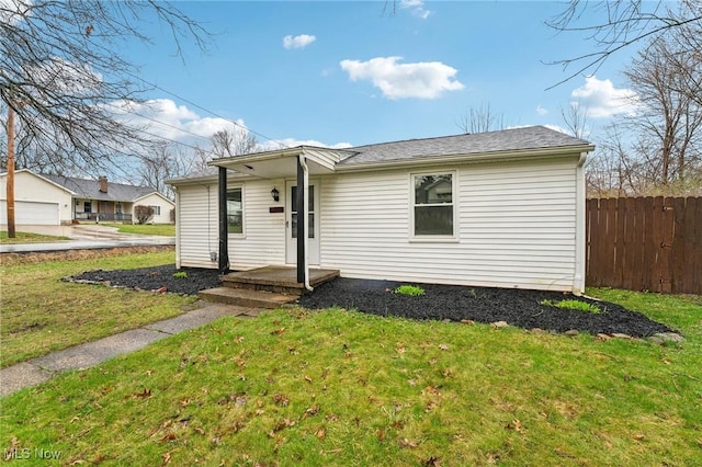 3665 Marcella Ave, Stow, OH 44224 - view of front facade featuring fence and a front lawn