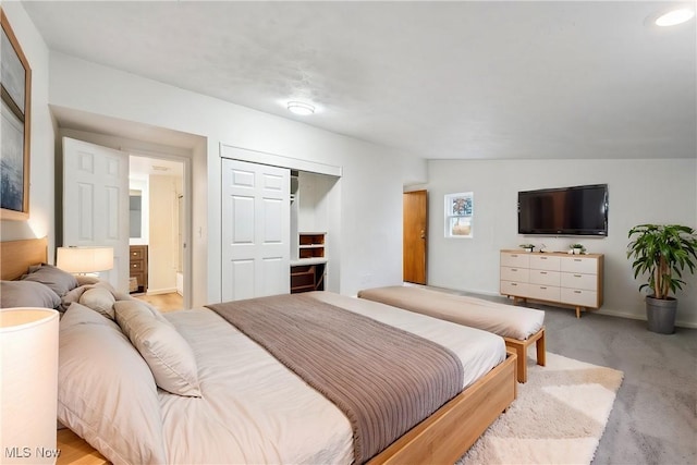 3665 Marcella Ave, Stow, OH 44224 - bedroom with light colored carpet, vaulted ceiling, and a closet