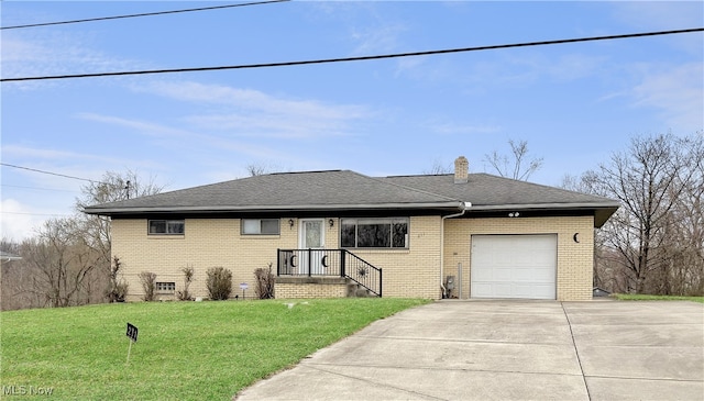 ranch-style home featuring a front yard, concrete driveway, a chimney, an attached garage, and brick siding