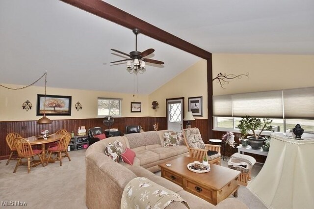1208 Berwyn Dr SW, Sherrodsville, OH 44675 - living room featuring a wainscoted wall, ceiling fan, light colored carpet, and wooden walls