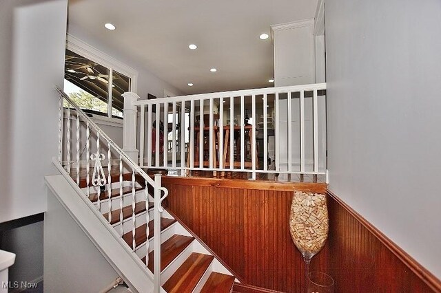 1208 Berwyn Dr SW, Sherrodsville, OH 44675 - staircase with a wainscoted wall and recessed lighting