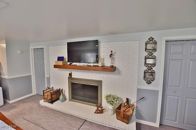 1208 Berwyn Dr SW, Sherrodsville, OH 44675 - living room featuring a brick fireplace and baseboards