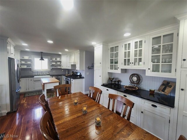 1208 Berwyn Dr SW, Sherrodsville, OH 44675 - dining room with dark wood-style floors and recessed lighting