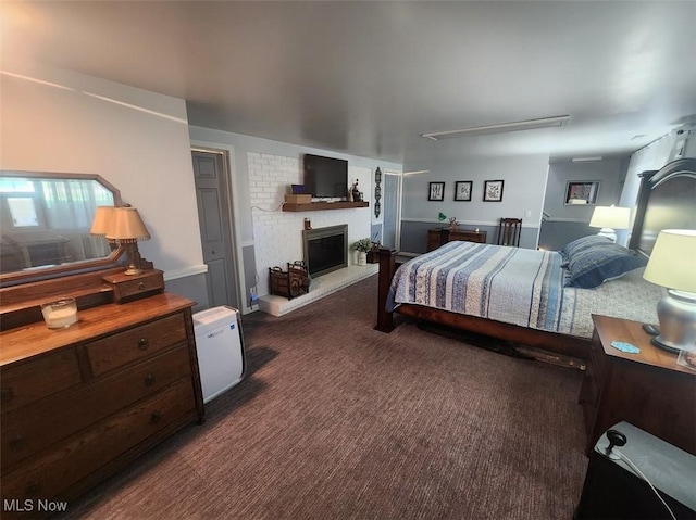 1208 Berwyn Dr SW, Sherrodsville, OH 44675 - carpeted bedroom featuring a fireplace
