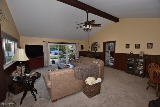 1208 Berwyn Dr SW, Sherrodsville, OH 44675 - living room with wainscoting, carpet flooring, wooden walls, beam ceiling, and a ceiling fan
