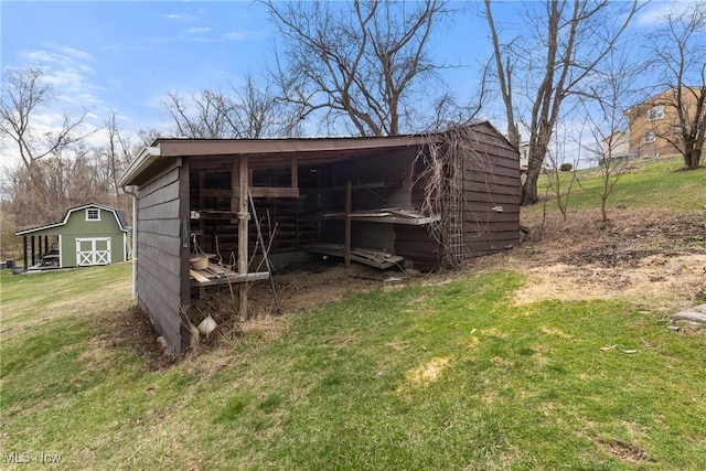 view of pole building with a yard