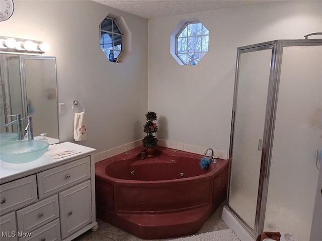 25977 E Hornsby Rd, Coolville, OH 45723 - full bath with vanity, a whirlpool tub, a stall shower, and a textured ceiling