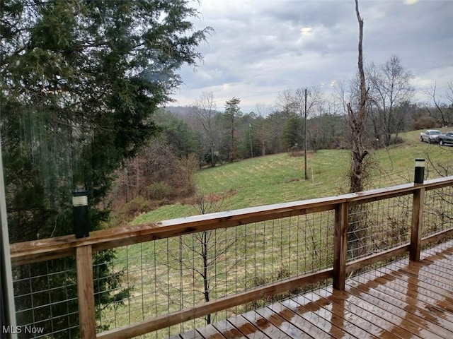 25977 E Hornsby Rd, Coolville, OH 45723 - wooden terrace with a lawn and a forest view