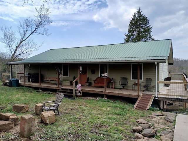 25977 E Hornsby Rd, Coolville, OH 45723 - back of property featuring metal roof