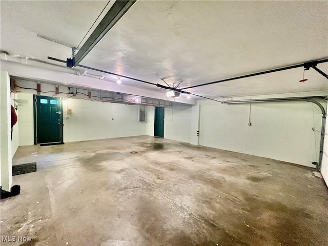 218 W Blvd, Mingo Junction, OH 43938 - garage featuring electric panel and a garage door opener