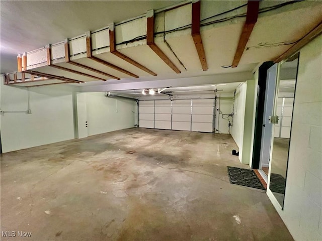 218 W Blvd, Mingo Junction, OH 43938 - garage featuring a garage door opener