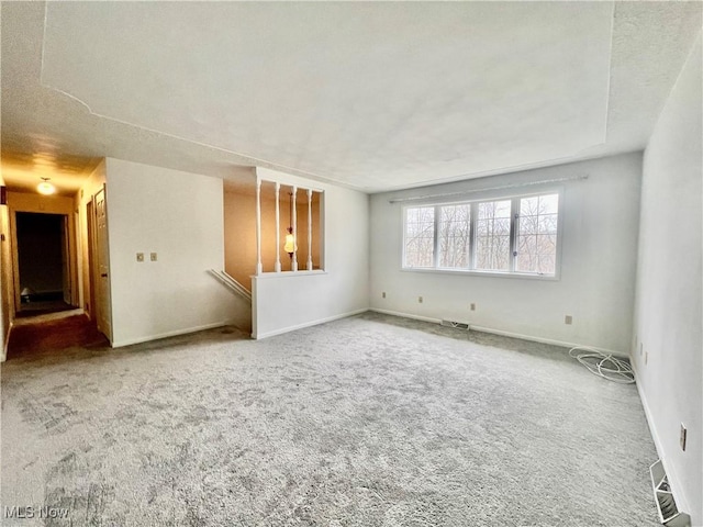 218 W Blvd, Mingo Junction, OH 43938 - spare room featuring baseboards, visible vents, and carpet floors