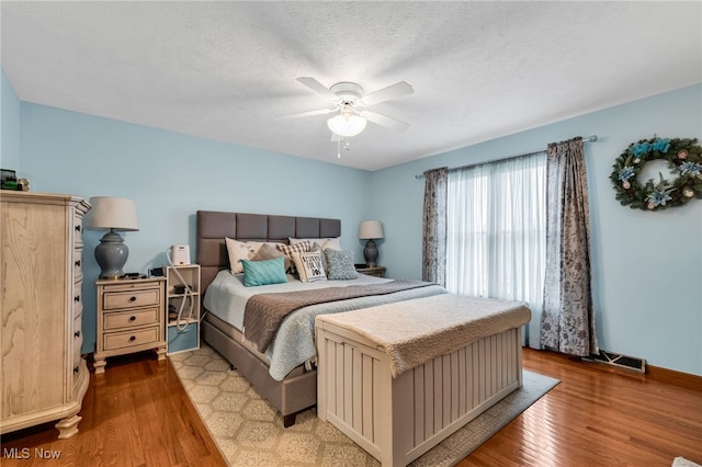 2816 Quail Run Ct, Lexington, OH 44904 - bedroom featuring wood finished floors and a ceiling fan