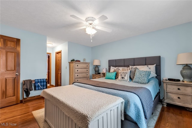 2816 Quail Run Ct, Lexington, OH 44904 - bedroom featuring wood finished floors and ceiling fan
