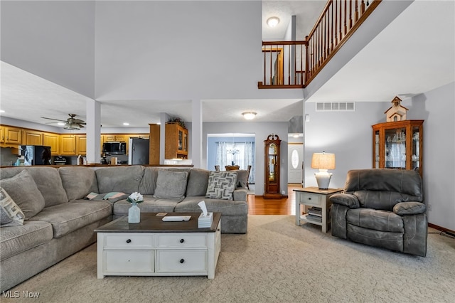 2816 Quail Run Ct, Lexington, OH 44904 - living area with a towering ceiling, ceiling fan, light colored carpet, and recessed lighting