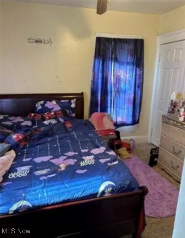 11704 Castlewood Ave, Cleveland, OH 44108 - bedroom with a ceiling fan and carpet floors