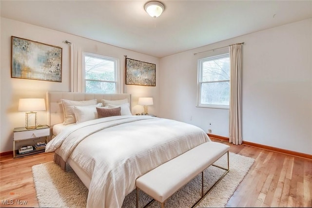 7074 Lake Shore Blvd, Mentor, OH 44060 - bedroom with baseboards and light wood finished floors