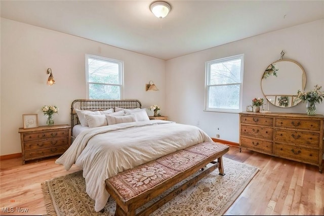7074 Lake Shore Blvd, Mentor, OH 44060 - bedroom featuring light wood-style flooring and baseboards
