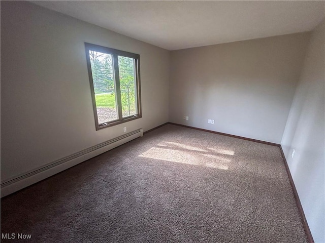 3013 Whispering Pines Dr, Canfield, OH 44406 - unfurnished room featuring baseboards, a baseboard heating unit, and carpet flooring