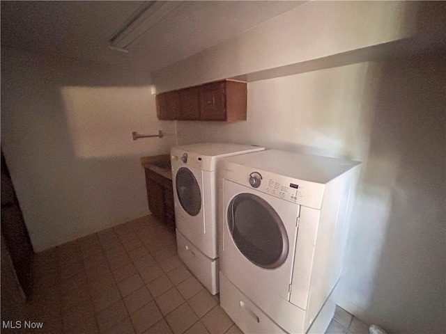 3013 Whispering Pines Dr, Canfield, OH 44406 - clothes washing area featuring light tile patterned floors, laundry area, and independent washer and dryer