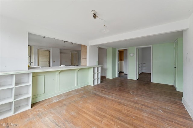 34 N Park St, Oberlin, OH 44074 - kitchen with wood finished floors, baseboards, and white gas cooktop