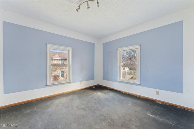 34 N Park St, Oberlin, OH 44074 - spare room featuring baseboards and a textured ceiling