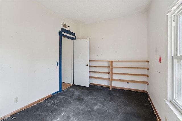 34 N Park St, Oberlin, OH 44074 - unfurnished bedroom featuring concrete floors