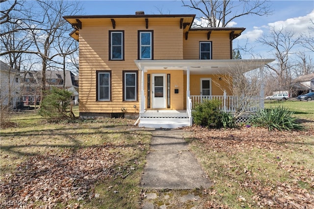 34 N Park St, Oberlin, OH 44074 - italianate home featuring a porch