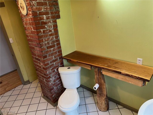 6232 Weaver Rd, Conneaut, OH 44030 - bathroom with toilet and tile patterned floors