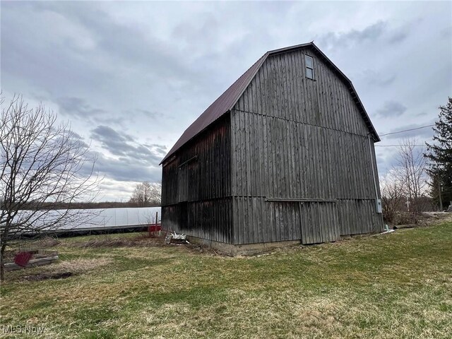 6232 Weaver Rd, Conneaut, OH 44030 - view of barn with a yard