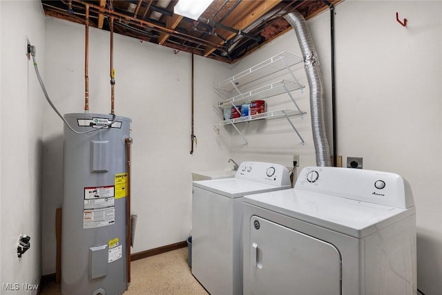 4613 Compass Rose Unit 10, Vermilion, OH 44089 - laundry room featuring electric water heater, separate washer and dryer, and baseboards