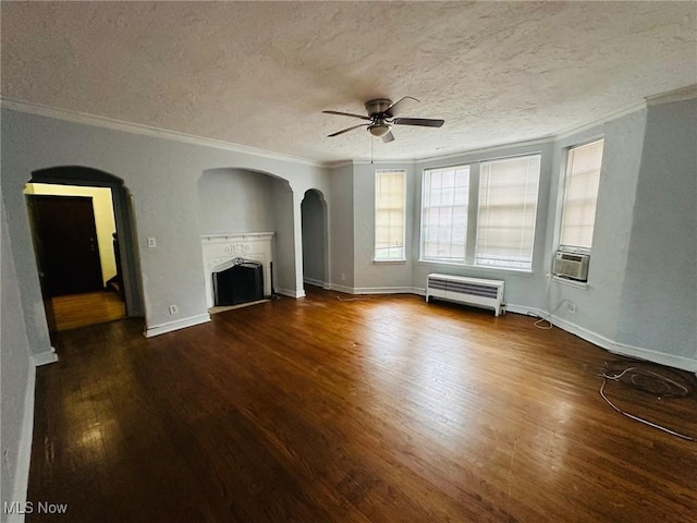 15610 Van Aken Blvd Unit 4, Shaker Heights, OH 44120 - unfurnished living room featuring radiator heating unit, ornamental molding, a ceiling fan, wood finished floors, and a textured ceiling