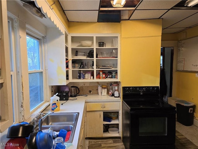 38 Royal Pl, Akron, OH 44310 - kitchen with black / electric stove, light countertops, open shelves, and a paneled ceiling
