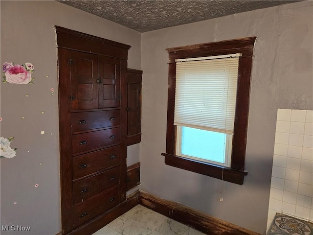 38 Royal Pl, Akron, OH 44310 - interior space with baseboards and a textured ceiling