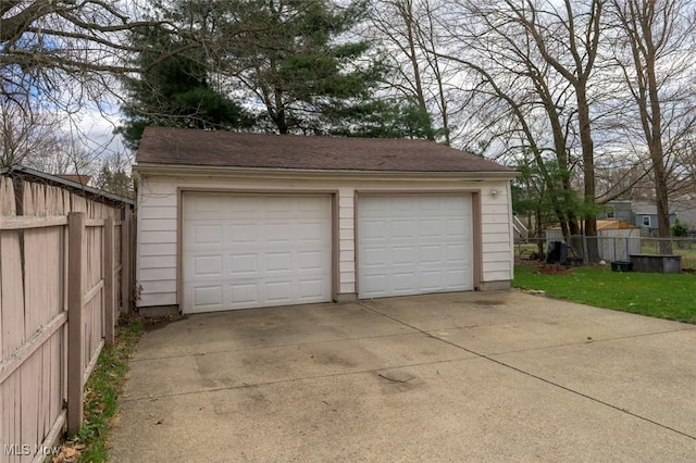 detached garage with fence
