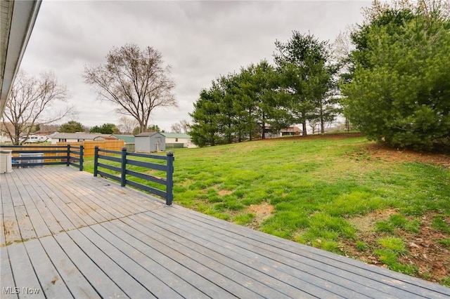 44 Hickory Dr, Little Hocking, OH 45742 - deck with a lawn, an outbuilding, and a shed