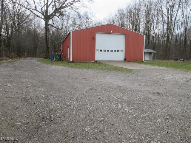 5372 Slater Rd, Williamsfield, OH 44093 - detached garage with dirt driveway