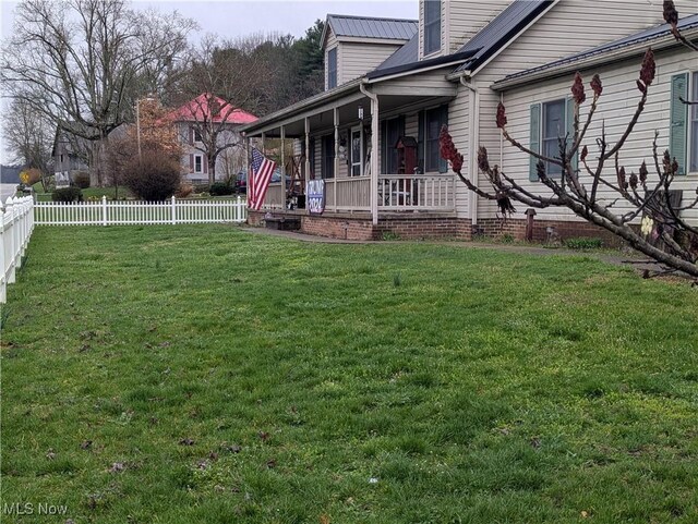 44790 County Road 23, Coshocton, OH 43812 - view of property exterior with covered porch, fence, and a yard