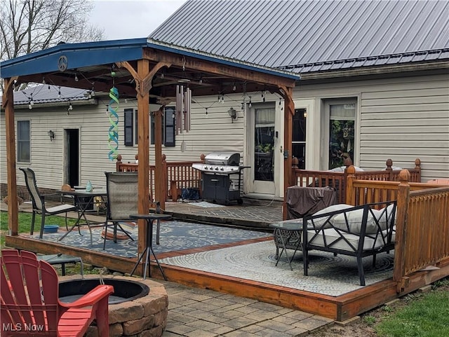 44790 County Road 23, Coshocton, OH 43812 - deck featuring grilling area, outdoor dining space, and a fire pit