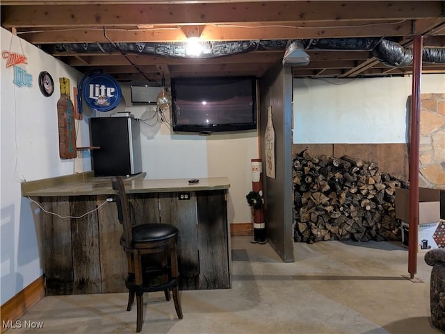 44790 County Road 23, Coshocton, OH 43812 - bar with a bar, concrete flooring, and freestanding refrigerator