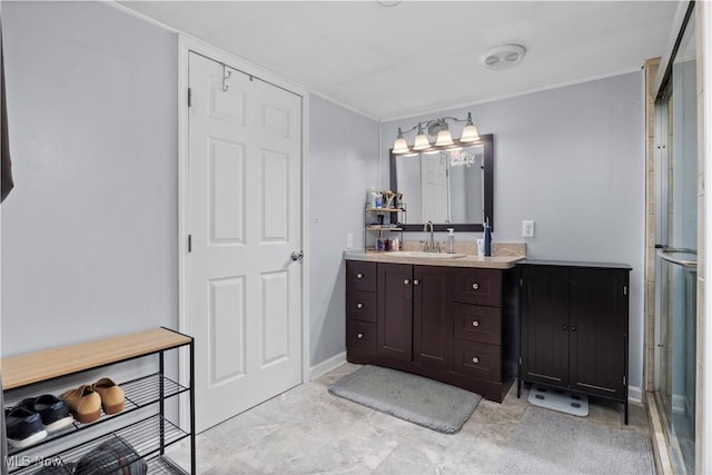 full bath with baseboards, visible vents, a stall shower, and vanity