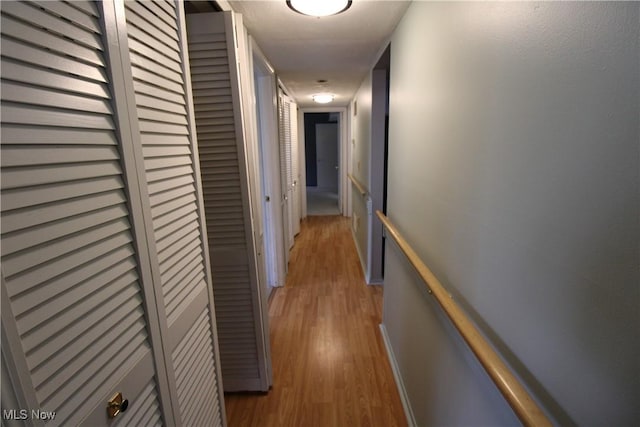 7073 Bristlewood Dr, Concord, OH 44077 - corridor with light wood-type flooring and an upstairs landing