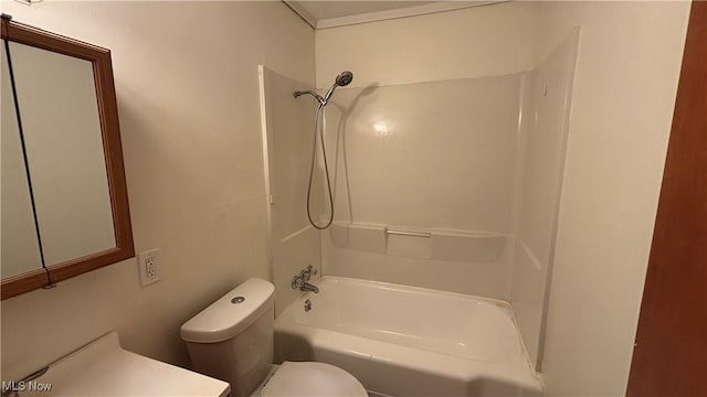 bathroom with shower / tub combination and toilet