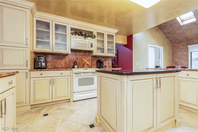 2 Salem Ct, Beachwood, OH 44122 - kitchen featuring glass insert cabinets, lofted ceiling with skylight, white appliances, tasteful backsplash, and cream cabinets