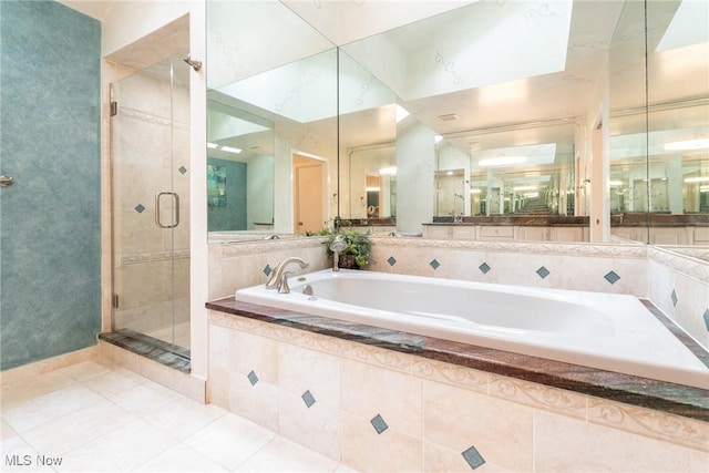 2 Salem Ct, Beachwood, OH 44122 - bathroom with a shower stall, tile patterned floors, and a garden tub