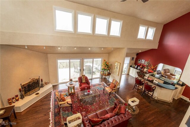 2 Salem Ct, Beachwood, OH 44122 - dining space featuring a high ceiling, baseboards, and wood finished floors