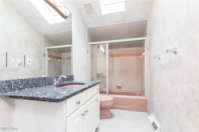 2 Salem Ct, Beachwood, OH 44122 - bathroom with toilet, visible vents, tile patterned flooring, and a skylight