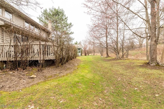 view of yard featuring a deck