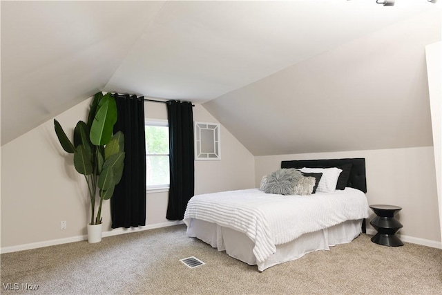 4019 W 226th St, Fairview Park, OH 44126 - carpeted bedroom featuring lofted ceiling and baseboards