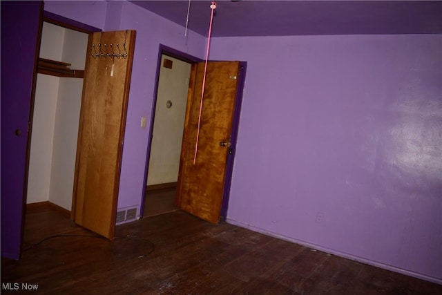 190 10th St, Campbell, OH 44405 - unfurnished bedroom with visible vents and wood-type flooring